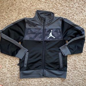 Boys size 4-5 black and gray zip up.